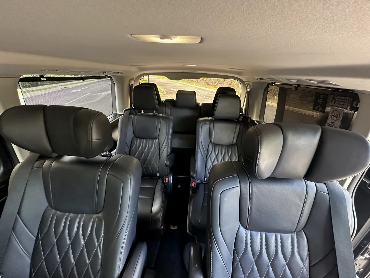 Multi-row seating layout inside ASCEND's Toyota Hiace Majesty